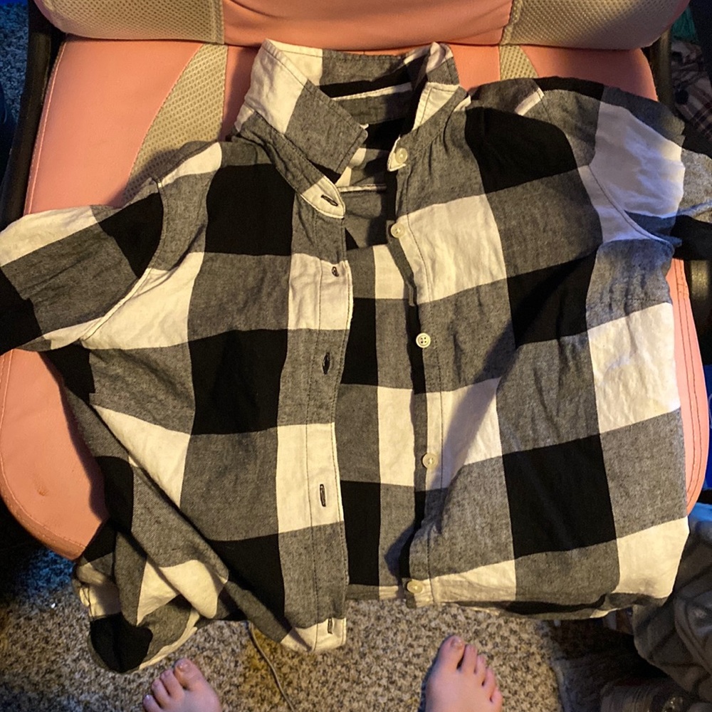This is a black and white plaid button up